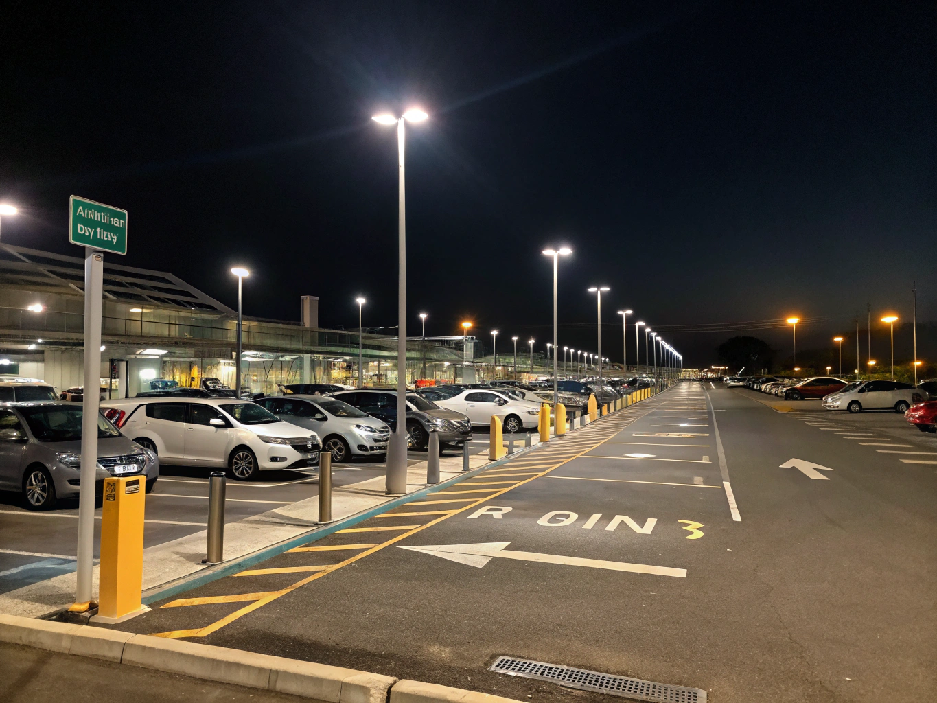 Secure lighted parking lot and modern entry gates
